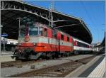 Die  Swiss-Express  Re 4/4 II 11109 mit dem IR 1539 von Lausanne nach Neuchâtel kurz vopr der Abfahrt in Lausanne.